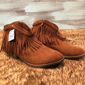 Short brown boots with a small heel.